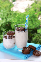 Milk cocktails in glasses and chocolate cookies