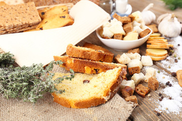 Homemade croutons on table in kitchen, close up