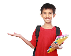 Portrait of boy with backpack presenting