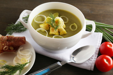 Leek soup on table, close up