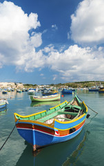 Fototapeta na wymiar traditional fishing boats marsaxlokk harbour malta