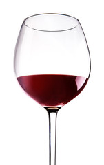 Red wine in the glass. close up. Isolated on white with path