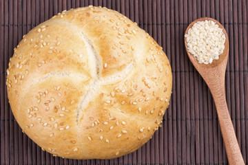 Sesame bread with sesame seed in spoon