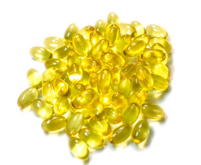 fish oil capsules on white background isolated