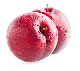 Plums isolated on white background