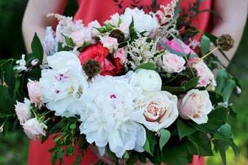 Colorful bouquet with white peony and pink roses