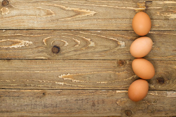 Top view of brown eggs