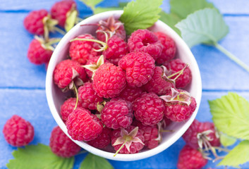 Bowl of red fresh raspberry