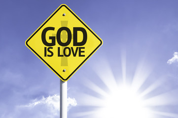 God is Love road sign with sun background