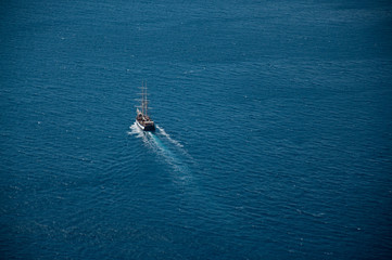 Boat In the Deep Blue Sea