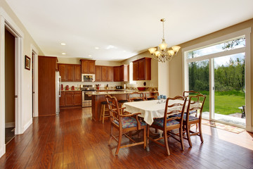 Spacious kitchen room with dining area and walkout deck