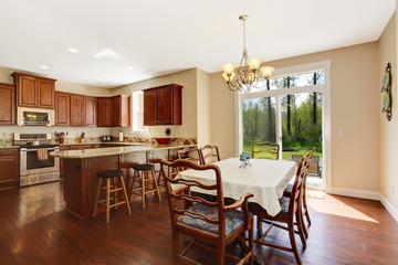 Spacious kitchen room with dining area and walkout deck
