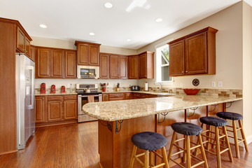 Kitchen room interior with island and countertop stools