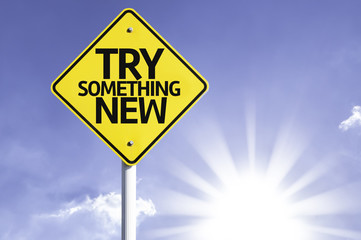 Try Something New road sign with sun background