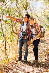 young couple mountain climbing