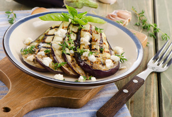 Grilled eggplant slices on a plate
