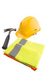Yellow hard hat, a hammer and orange and yellow reflective vest 