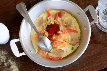 Breakfast with fried eggs pan