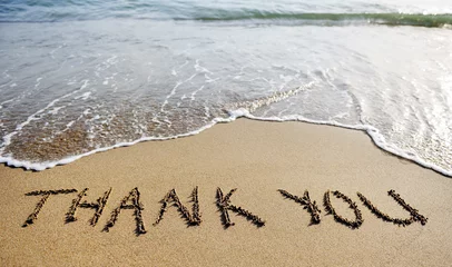  dankwoord getekend op het strandzand © tanialerro