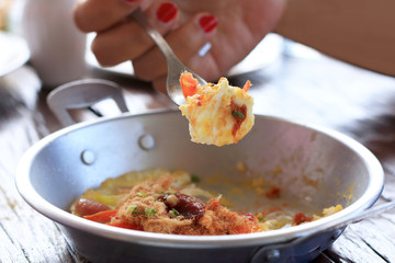 Breakfast with fried eggs pan