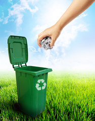 Green plastic trash recycling container ecology concept.