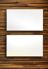 blank business cards on bamboo background