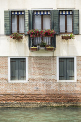 Fototapeta na wymiar House beside water at Venice. Italy