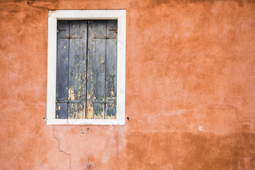 Fototapeta na wymiar Old vintage window at Venice. Italy