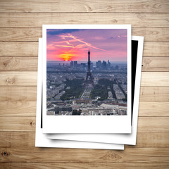 Eiffel Tower memory on photo frame brown wood plank background