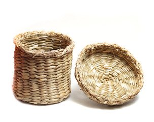 small cylindrical wicker basket
