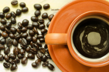 Coffee cup and coffee beans