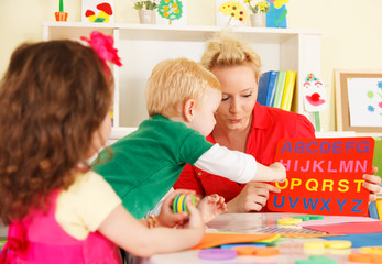 Pre-school children in the classroom with the teacher