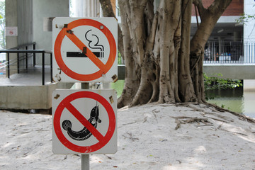 No smoking and no fishing sign in the park.