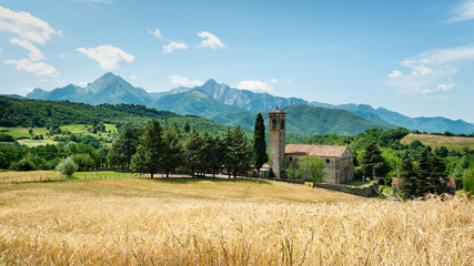 Rural scenery with typical church. Tuscany, Italy.