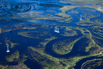 Aerial view flooded area with power lines