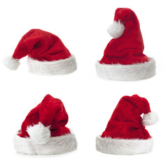 Vier Nikolausmützen auf weissem Untergrund