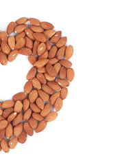 Obraz premium Almonds in half of heart shape.