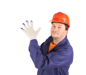 Worker putting on rubber glove.