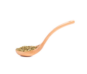 Spoon with pumpkin seeds.