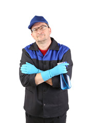 Man in workwear with a spray.