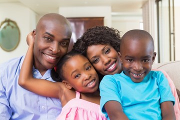 Happy family relaxing on the couch