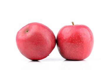 Fresh red apple on a white background