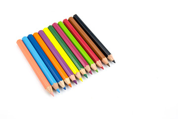 colorful pencils on white background