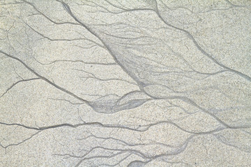 Textures of freshwater veins in the sand, Galapagos, Ecuador - obrazy, fototapety, plakaty