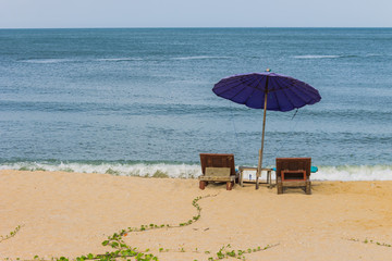 Chairs and umbrella on the beach, Huahin, Thailand