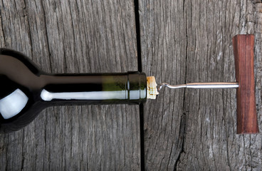 Wine bottle on a wooden table