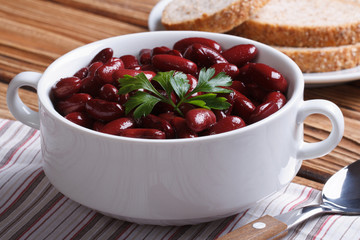 red beans boiled with parsley in white bowl horizontal