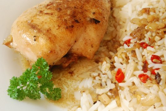 H&auml;hnchenbrust in scharfer Zitronensauce auf Reis