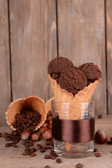 Tasty chocolate ice cream in waffle cone