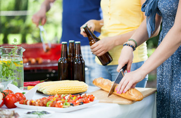 People enjoying barbecue